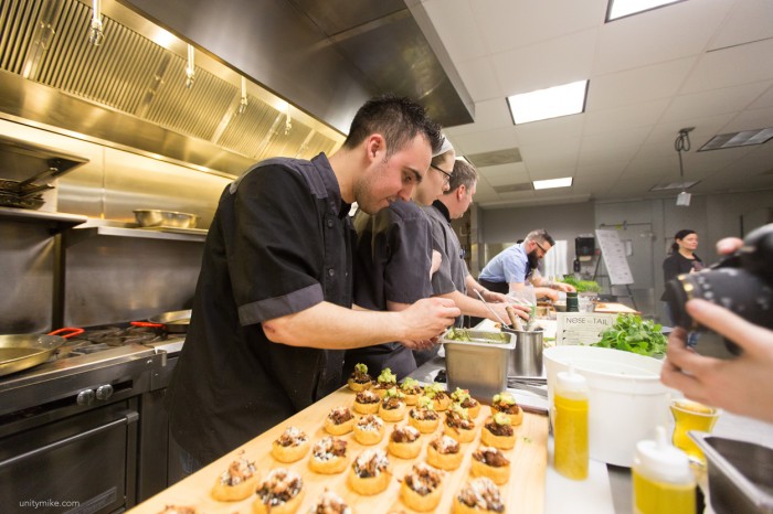 Chefs preparing the first course at Test Kitchen