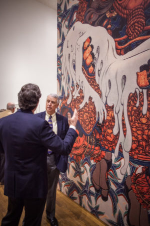 Worcester Art Museum members discussing art at the Samurai! opening in April. (