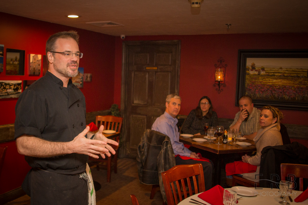 Chef Chris Rovezzi talking with the group about his culinary journey