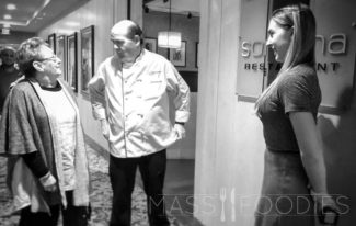 Veteran food writer, Barbara Houle praises Executive Chef Bill Brady. Sarah Connell, right. Outside of the interior entrance of Sonoma at the Beechwood Hotel in Worcester, MA.