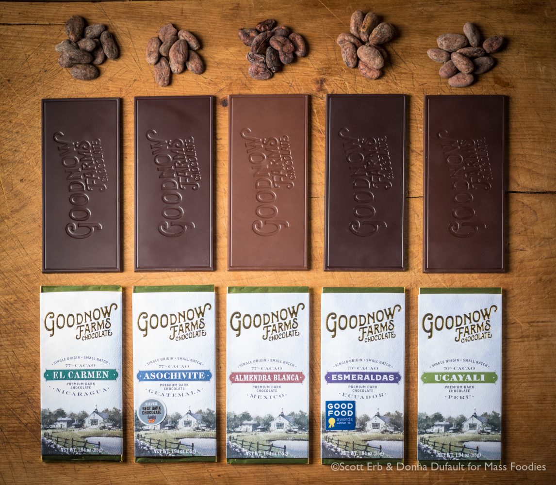 Five single origin dark chocolate bars from Goodnow Farms and the beans used to produce them. The middle one, made from Mexican beans, actually has the highest cocoa content: 77% (Erb Photography for Mass Foodies)