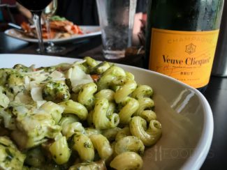 Chicken Pesto Pasta from 110 Grill in Worcester, MA (PAN-SEARED CHICKEN, ROASTED TOMATOES, ARTICHOKES AND CAVATAPPI PASTA, TOSSED IN A CREAMY PESTO SAUCE AND FINISHED WITH SHAVED REGGIANO.)