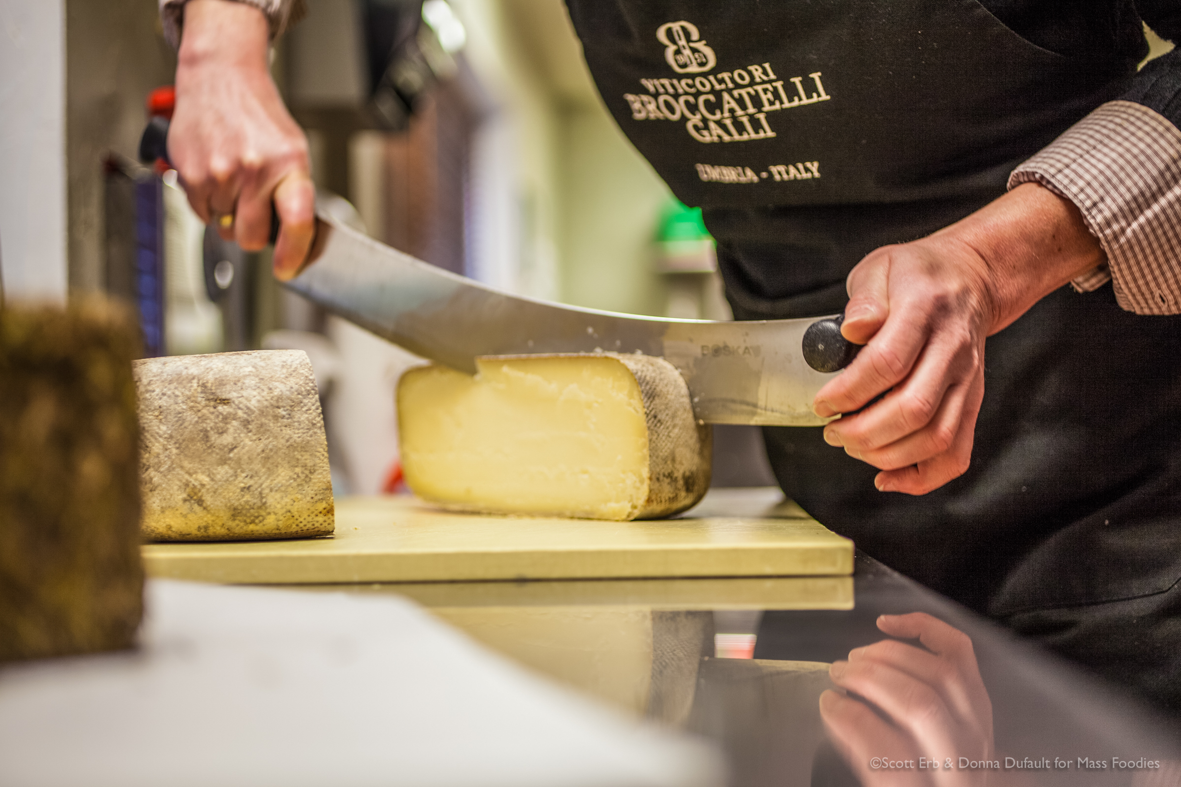 Simone Linson cutting cheese at Pecorino in Grafton, MA (Photo: Erb Photography)
